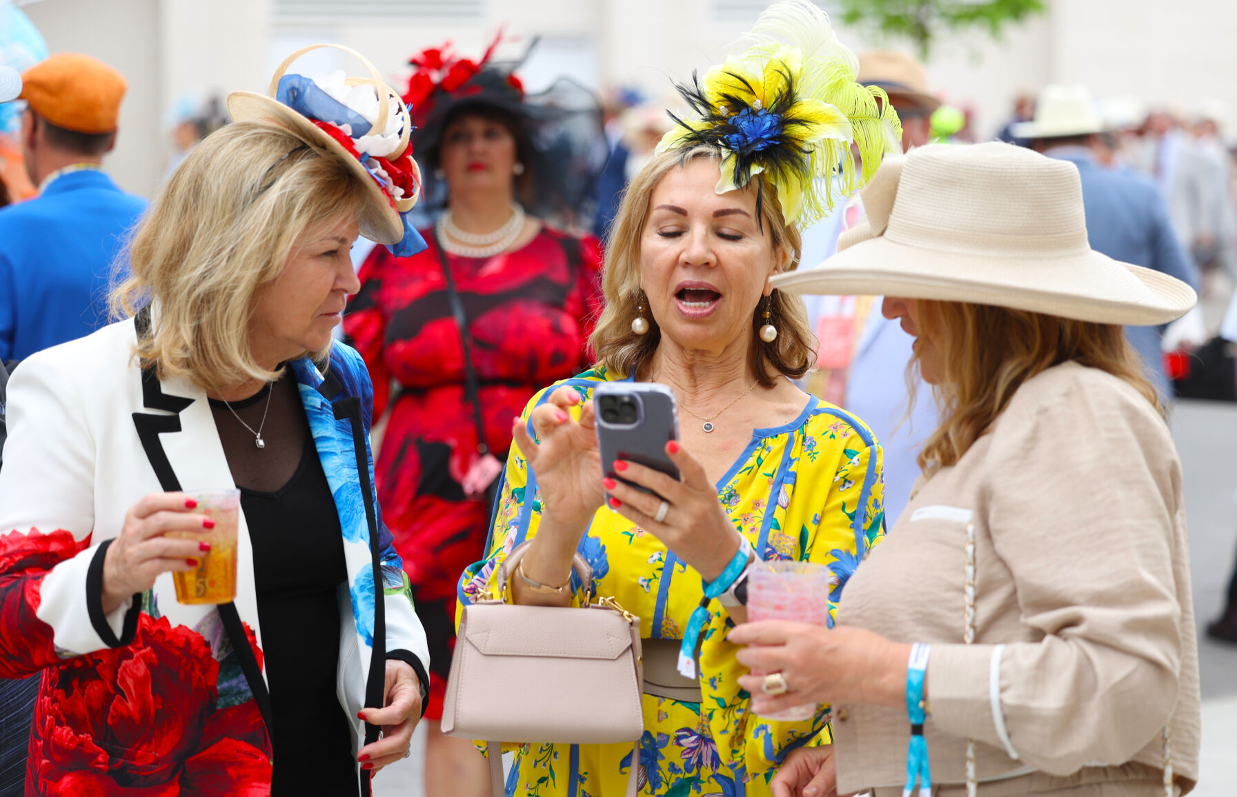 3 women talk on the phone at Churchil.JPG